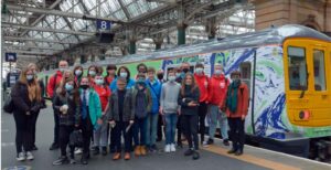 Youth Group Boards Train to a Green Future